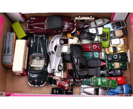 A tray containing a collection of mixed scale modern issue diecasts, with examples to include a Sun Star 1/18th XK140, a Neo 