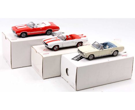 A collection of three various boxed 1/24 scale Franklin Mint diecast models, to include a 1969 Chevrolet Camaro SS, a 1966 Fo
