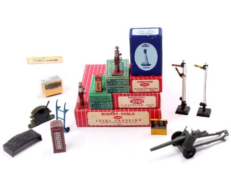 Various Hornby-Dublo accessories: 2460 2-rail level crossing (VG) (BVG); two 5095 buff water cranes (E) (BVG); 5040 box of 6 