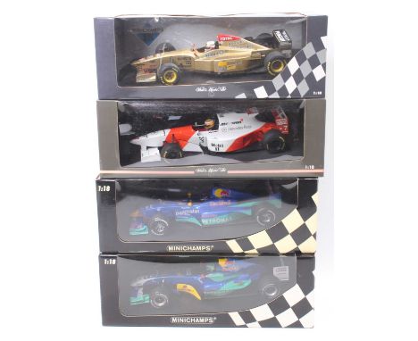 A Minichamps 1/18th scale Formula 1 racing car group of 4 comprising a Felipe Massa Sauber Petronas C23, a Pedro Diniz Red Bu