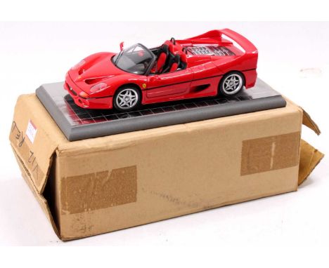 A Tag Precision Models 1/18 scale boxed diecast model of a Ferrari F50 housed in the original card box with leaflet and displ