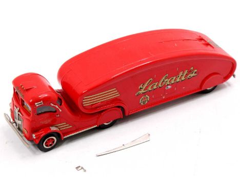 A loose DMP Studios of Canada 1/48 scale resin and white metal model of a Labatt's 1947 streamliner tractor unit and trailer,