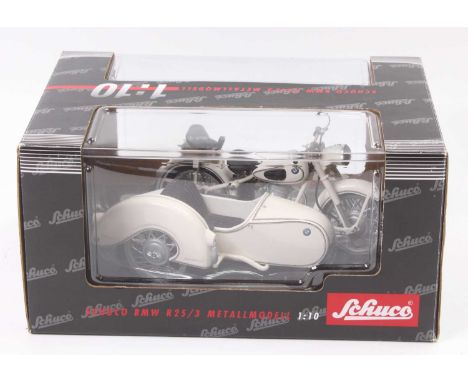 A Schuco 1/10 scale boxed diecast model of a BMW R25/3 motorcycle &amp; sidecar, comprising of cream body, housed in the orig