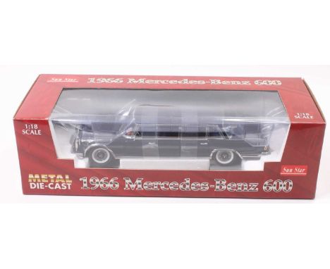 A Sunstar No. 2203 1/18 scale model of a 1966 Mercedes Benz 600, finished in dark blue, with white wall tyres, housed in the 