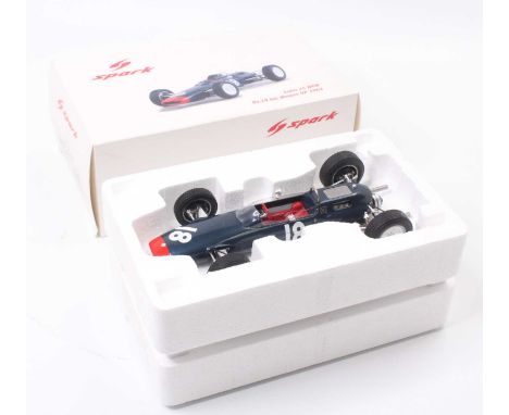 A Spark Models 1/18 scale resin and diecast model of a Lotus 25 BRM Formula One race car No. 18 from the 1964 Monaco GP house