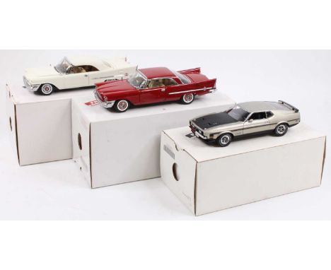 A collection of Danbury Mint 1/24 scale diecast and pewter miniatures to include a 1958 Chrysler 300D Sport Coupe, a 1957 Chr