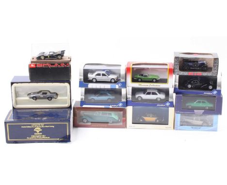 One box containing a collection of 12 various 1/43 scale diecast miniatures to include Kyosho, Solido, Rex Toys, and others, 