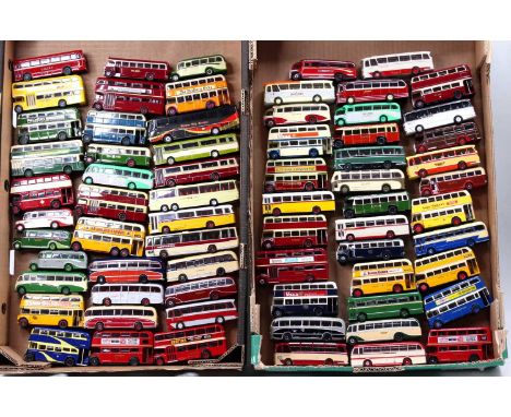 2 trays containing a large quantity of 1/76th scale diecast bus and coach models, with examples including a Corgi Toys Trolle