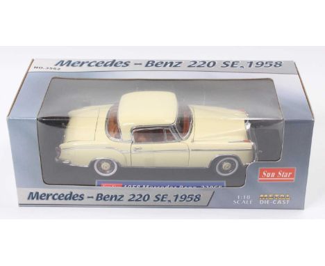 A Sunstar No. 3562 1/18 scale diecast model of a Mercedes Benz 220SE 1958 finished in cream, housed in the original window bo