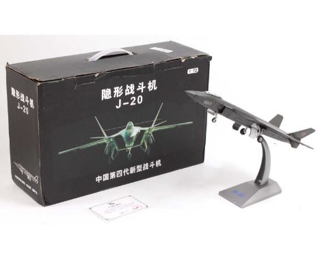 A Terebo of China 1/72nd scale J-20 fighter jet with stand, as issued in its original polystyrene packed box