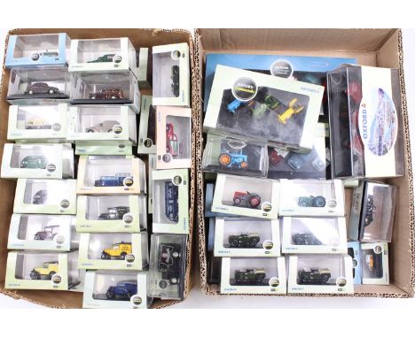 Two boxes containing a collection of various N gauge and 1/76 scale miniature Oxford diecasts to include a JH Taylor &amp; So