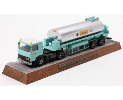 A 1/50 scale SCR diecast and white metal desk display model of a Volvo tractor unit with hazardous tanker trailer, model fini