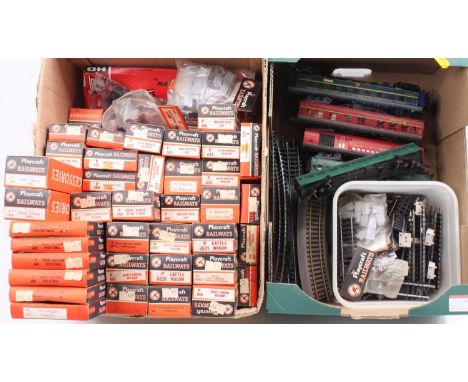 Two boxes containing a collection of mixed Playcraft, HO scale railways, to include various loose rolling stock, locomotives,