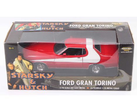 An American Muscle by ERTL 1/18 scale model of a Starsky &amp; Hutch Ford Gran Torino, housed in the original window display 