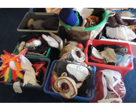 A large quantity of theatrical costume accessories including heads, hats, braces, small props and other similar items (a lot)