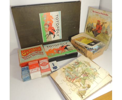 A Totopoly game with board; some Bayko Building items with instructions; playing cards in packs; an Edwardian Comical Puzzle 