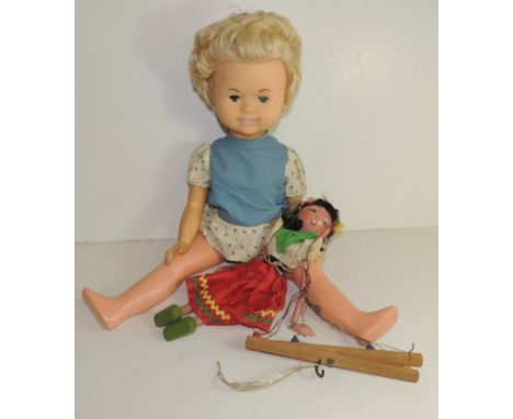 A Pelham puppet Gypsy, unboxed together with a Rosebud doll 53cms high (2)