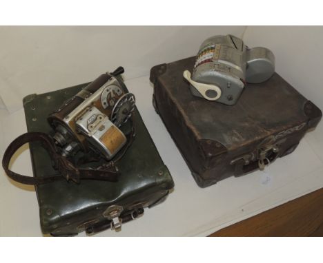 A Ticket Issue Machines bus ticket machine on original leather strap and in metal case together with an Almex ticket machine 