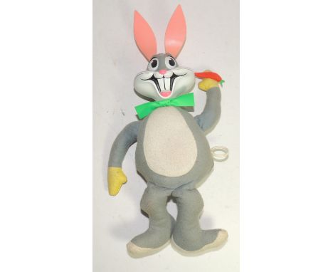 A Mattel Bugs Bunny "talking" toy having moulded plastic head, soft cotton body and pull string to one side operating voice, 