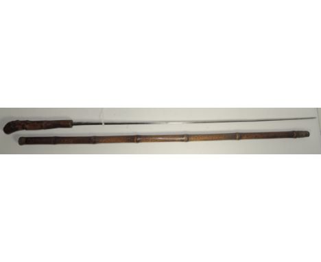 A late 19th Century sword stick having cane handle and shaft, the square tapering blade stamped "De La Houssifre" blade 63.5c