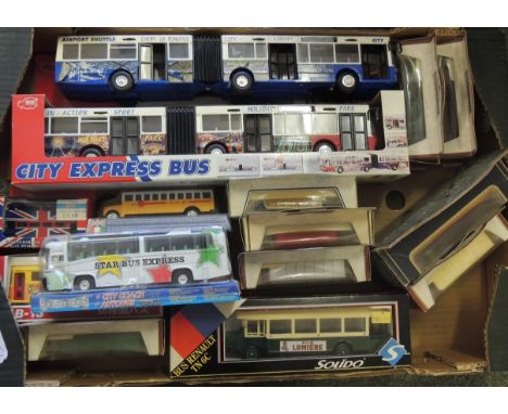 A quantity of boxed models of buses and coaches including Solido and Days Gone 