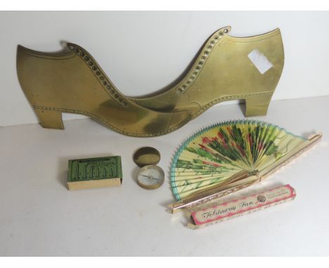 A small compass in brass case; two Victorian flat brass boot ornaments; a folding fan in case and paper fasteners in box