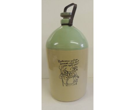 A large Coates Cider stoneware flagon with light green shoulders and with black printed image of the singing farmers, with st