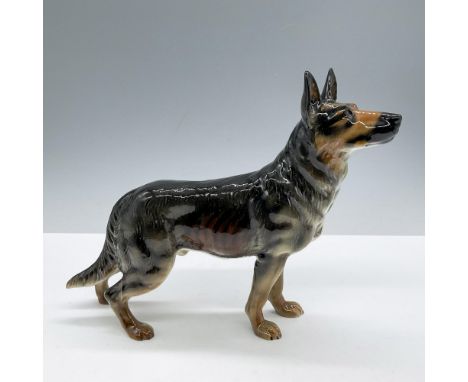 Glossy finish. Featuring a black and brown dog in a dynamic standing pose. Goebel backstamp. Marked 1968. Issued: 1968Dimensi