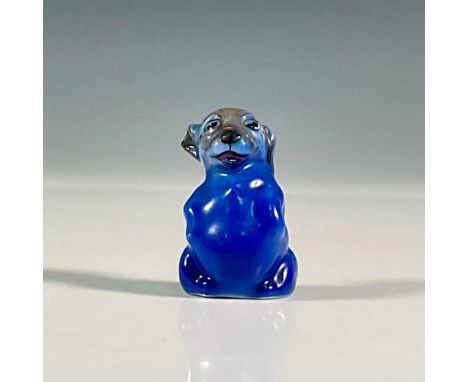 Style Three - small mouth - blue glaze. A figure of a dog on its hind legs. Doulton stamped. Model number 387. Artist: Charle
