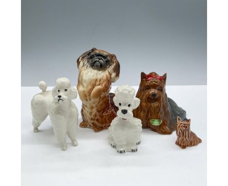 Charming collection of beloved and elegant pet figurines, featuring Poodles, Yorkshire terriers, and Pekingese dogs. Includes