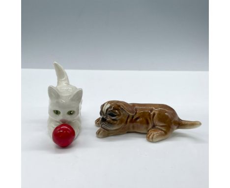 These charming glazed duo features a playful white kitten with vibrant green eyes, captivated by a bright red ball, and a coz