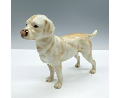 Vintage glossy porcelain. Depicts a golden and white standing dog. Goebel backstamp. Marked 1968. Issued: 1968Dimensions: 9''