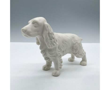 Unglazed finish. Features a white unpainted standing dog. Goebel backstamp. Issued: 20th centuryDimensions: 6''L x 1.75''W x 