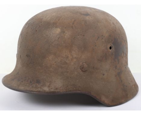 WW2 German M-40 Tropical Camouflaged Steel Combat Helmet, good untouched example of a M-40 pattern steel combat helmet which 