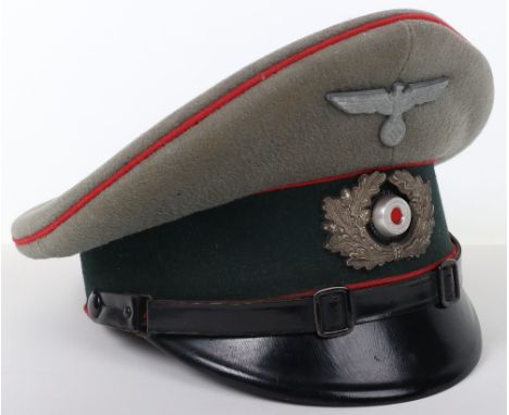 WW2 German Army Artillery NCO’s Peaked Cap, fine untouched example constructed of a fine wool with bottle green central band,