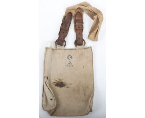 WW1 Turkish Army Canvas Water Carrier, heavy canvas pouch with a white porcelain spout top and heavy duty brass fixing rings 