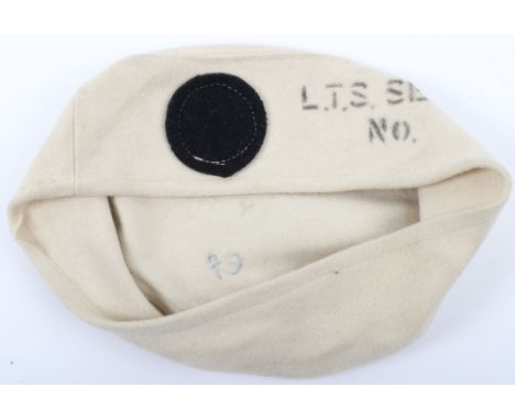 WW2 British Home Front Royal Ordnance Factory Felt Headdress, white felt body with black felt circle to the front and stencil