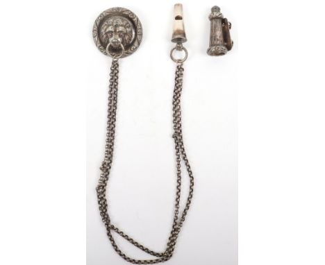 British Army Officers Cross Belt Fittings, being a silvered two piece lion head boss with linked chain leading to whistle in 