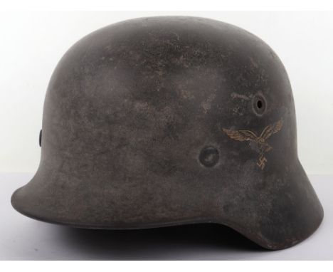 WW2 Luftwaffe M-40 Steel Combat Helmet, good untouched example with much of the original Luftwaffe blue paint finish to the e
