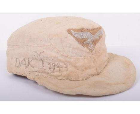 Unique Luftwaffe Tropical Afrika Korps (D.A.K) Prisoner of War Field Cap, an interesting bleached white cloth peaked field ca