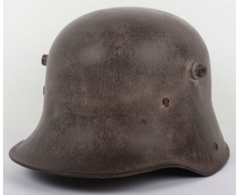 WW1 German M-16 Steel Combat Helmet, good untouched example retaining much of its original field grey / green paint finish to