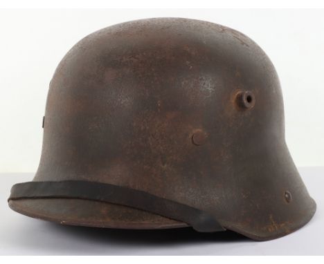 Imperial German M-16 Steel Combat Helmet, good untouched example of a standard M-16 steel combat helmet which has a dark fiel