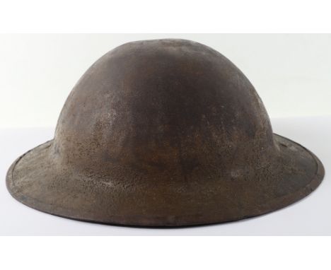 WW1 British Steel Combat Helmet, good example of a combat worn 2nd pattern Brodie helmet with the covering to the shell brim.