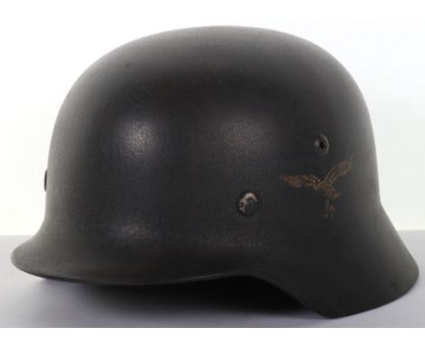 WW2 German Luftwaffe M-35 Steel Combat Helmet, good untouched example which retains much of its original dark blue paint fini