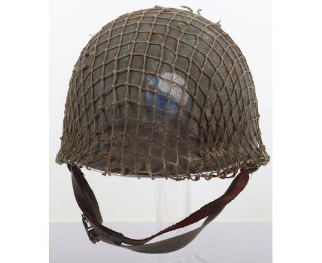 WW2 American Fixed Bale M1 Steel Combat Helmet, being a standard model M1 shell with split to the aluminium front seam. Helme