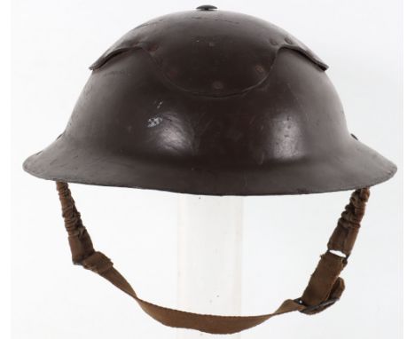 WW2 British Home Front Helmet, being a Cromwell pattern helmet produced in pressed fibre. With plate to the top section of th