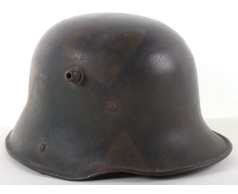 Imperial German M-17 Camouflaged Steel Combat Helmet, good untouched example of a Model 1916 steel helmet shell with the 1917