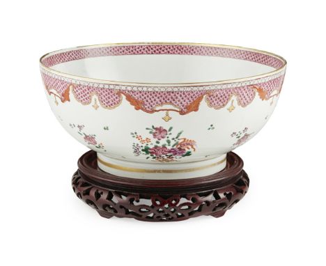 TWO PORCELAIN PUNCH BOWLS19TH CENTURY the first, a Samson example decorated with flower sprays with a pink scale border and g