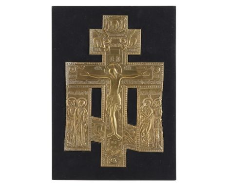 TWO RUSSIAN RELIEF CAST BRASS CRUCIFIXESLATE 18TH CENTURY of similar design, the figure of Christ flanked by saints and surmo