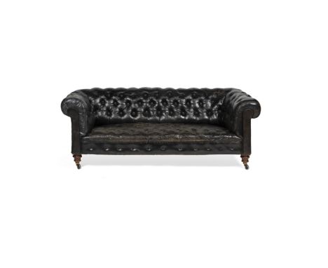 VICTORIAN LEATHER CHESTERFIELD SOFALATE 19TH CENTURY of typical form covered in black button-upholstered leather, on turned m